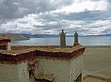 Tibet Kailash 07 Manasarovar 12 Chiu Gompa with Lake We climbed to the roof of Chiu Gompa and enjoyed a stunning view of Lake Manasarovar. Alas, once again, Kailash remained veiled.